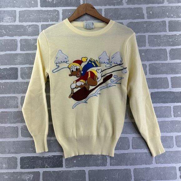 Vintage 80s Size M Cream Daffy Duck Sledding Sweater Walt Disney - Picture 1 of 5